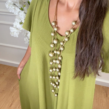 Vestido oversize com folho na manga em Verde Azeitona