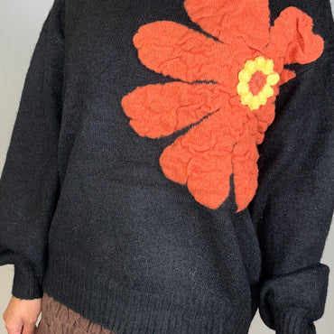 Camisola malha com flor em Preto