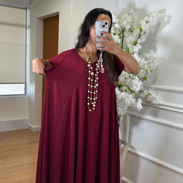 Vestido oversize com folho na manga em Bordo