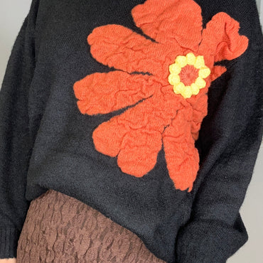 Camisola malha com flor em Preto