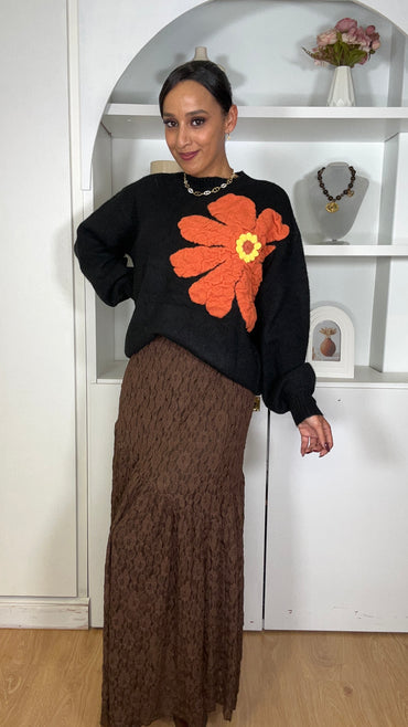 Camisola malha com flor em Preto