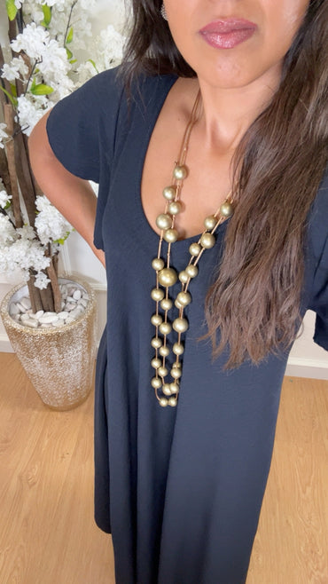 Vestido oversize com folho na manga em Azul Marinho