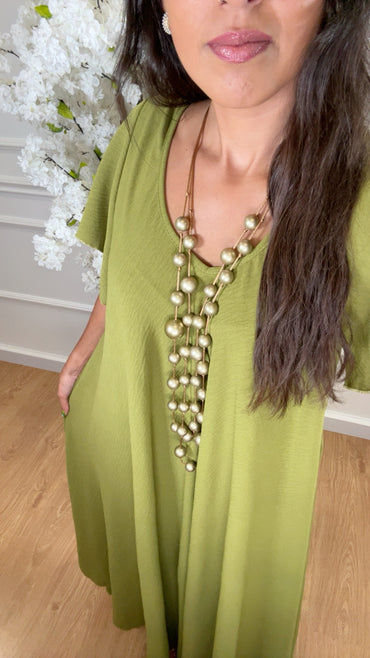 Vestido oversize com folho na manga em Verde Azeitona