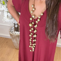 Vestido oversize com folho na manga em Bordo