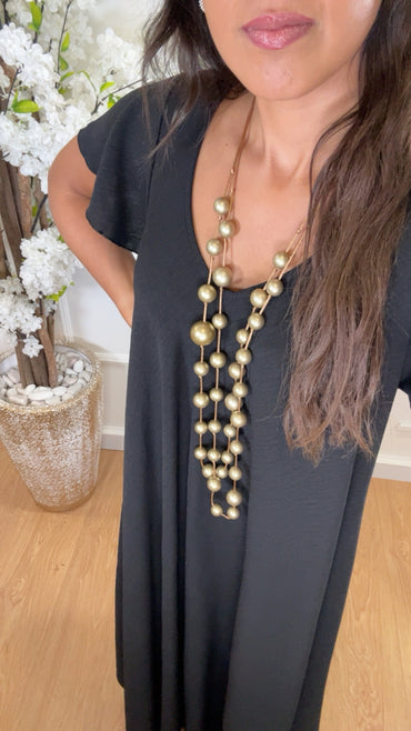 Vestido oversize com folho na manga em Preto