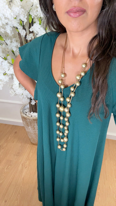 Vestido oversize com folho na manga em Verde Esmeralda