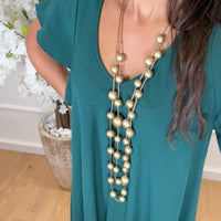 Vestido oversize com folho na manga em Verde Esmeralda