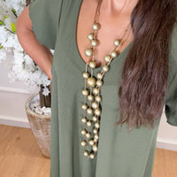 Vestido oversize com folho na manga em Verde Tropa