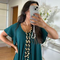 Vestido oversize com folho na manga em Verde Esmeralda