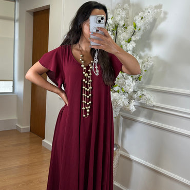 Vestido oversize com folho na manga em Bordo