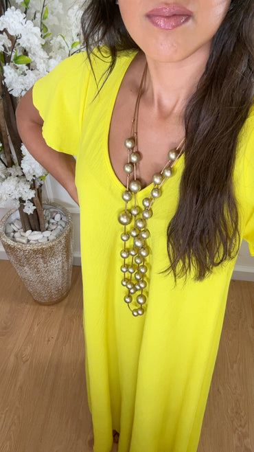 Vestido oversize com folho na manga em Amarelo