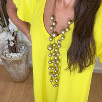Vestido oversize com folho na manga em Amarelo