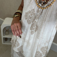 Conjunto Blusa + pantalona com padrão em Bege